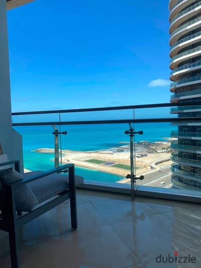 At a very special price, a ready-to-move-in apartment with a panoramic view in the Alamein Towers, ultra super luxurious finishing