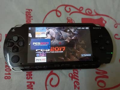 psp 1000+ لعبة50 +شاحن + الكرت8جيجا +بطارية