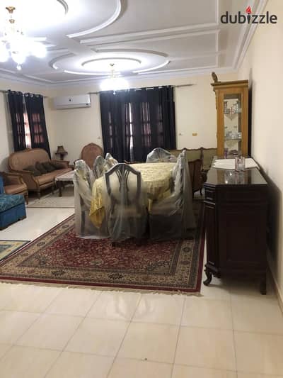 For rent furnished with air conditioning, a 3-bedroom apartment near the Air Hospital in the Fifth Settlement