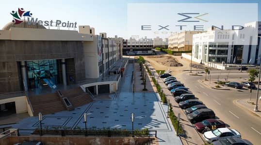 Office for rent inside a commercial mall in front of the University of Culture and Science and on the central axis in 6th of October City in a prominent location
