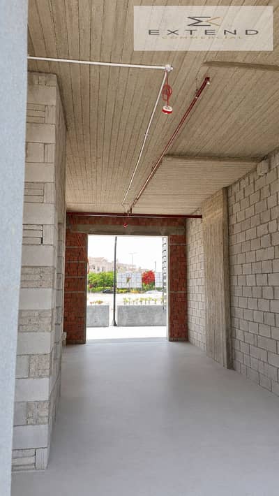 Shop for rent in New Cairo near Al-Banfsaj suitable for a café in a distinctive commercial location
