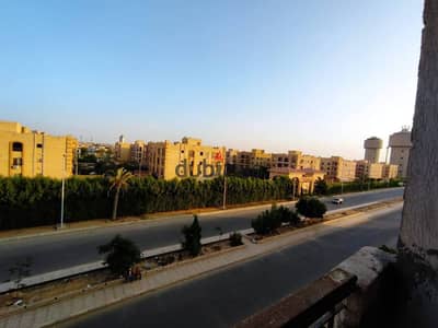 شقه للبيع بالمنطقه الثامنه عمارات امام كمبوند حسن علام واجهة اماميه