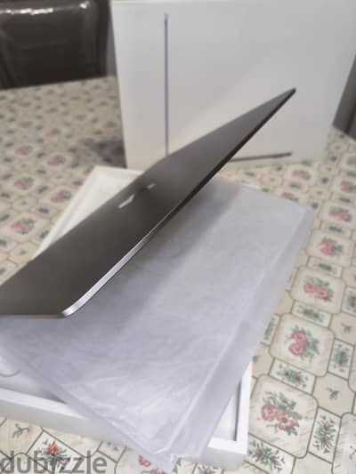 MacBook air M2 100% 20C. C 2025 MANUFACTURING Arabic English keyword