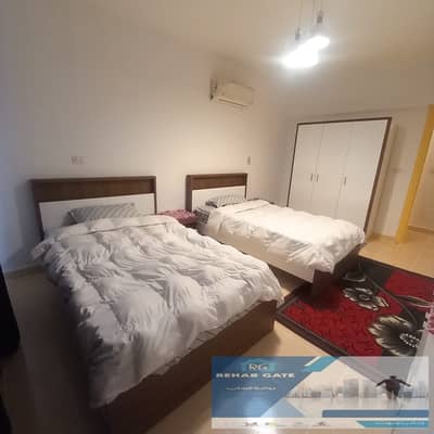 Furnished apartment for rent in Al Rehab City 2, located directly across from the Eastern Market. Situated on the second floor of a building with an e