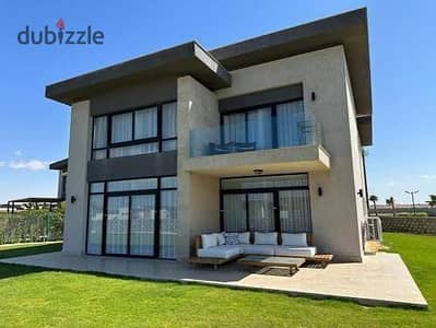 Fully finished villa for sale by Hassan Allam, located directly on North 90th Street next to the American University (AUC), in the Grova compound