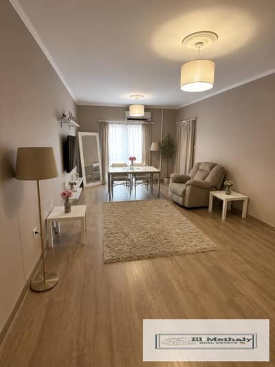 Freehold apartment for sale in Al Rehab City, New Cairo.