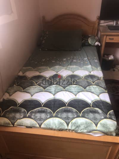Single 1m wooden bed used with mattress