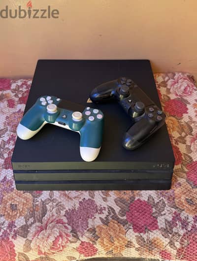 بلاستيشن 4 pro مع دراعين