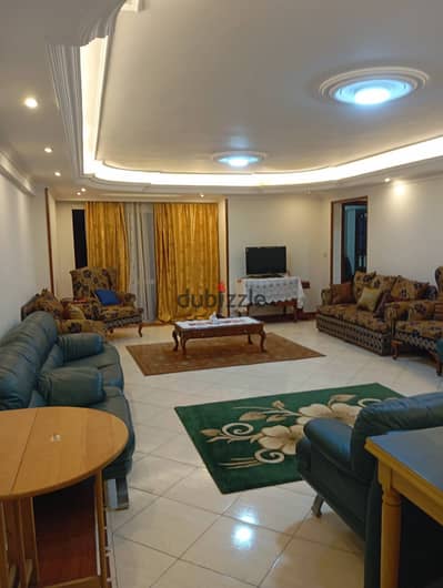 Apartment 180m furnished air-conditioned for annual rent on Al-Sharif Gamal Abdel Nasser Street on a corner for lovers of upscale living
