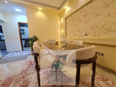 Furnished ground floor apartment for rent in Garden Compound, Al Khamael, New Plateau (Palm Hills Plateau), prime location, modern furnishings, fully
