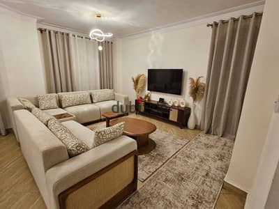 Furnished apartment for rent in Retaj Compound, hotel-style furnishings overlooking Al-Jazeera Compound