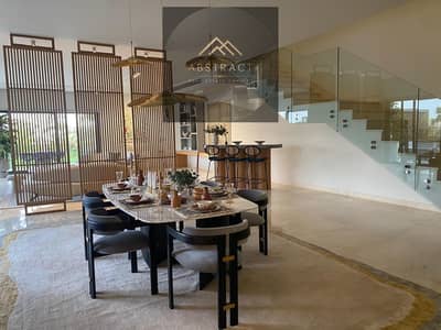 A villa with a 65% discount, fully finished, with installments over 15 years, with a garden + rooftop with a fence, with Sodic near Madinaty