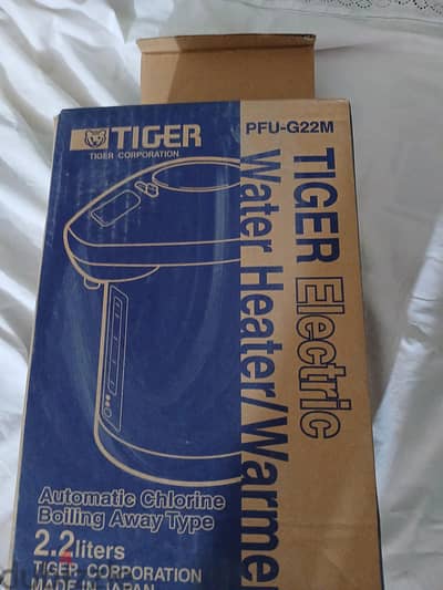 ترمس كهربائي تايجر ياباني أصلي 2.2 لتر Tiger - جديد بالكرتونة