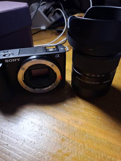 كاميرا سوني zv e10 كسر زيرو مع عدسة سيجما 18-50 f2.8