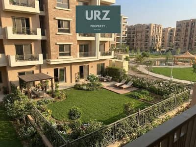امتلك جاردن فيلا 353 م في شقة ارضي ومدخل خاص بفيو فتوح علي greenery بخصم للبيع علي طريق السويس بالقرب AUC التجمع الخامس وابراج SPINE بجوار مدينتي