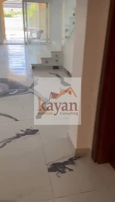 Twin apartment for rent with kitchen and air conditioning in Mivida Compound