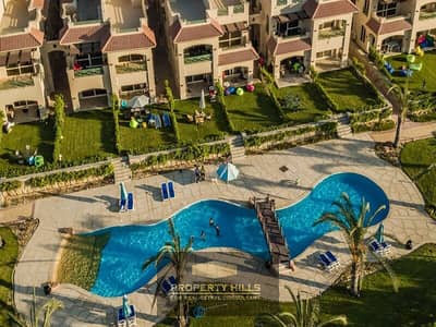 A furnished chalet with immediate delivery in La Vista Cascada by the sea, directly next to Marassi and Waves