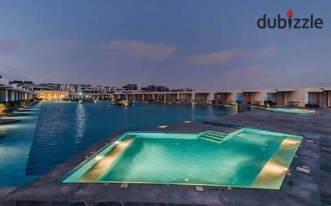 Fully Finished 1-Bedroom Chalet with ACs for Sale Directly on the Lagoon | Prime Location in Ras El Hekma | Next to Cali Coast