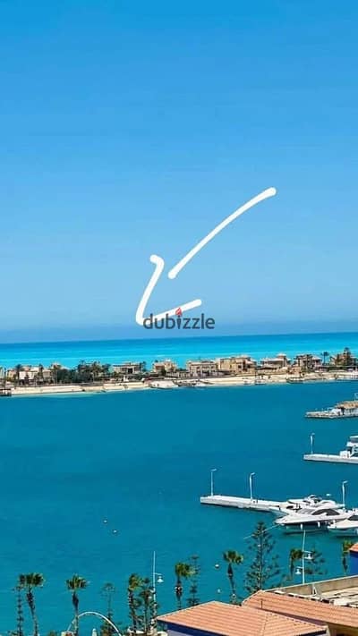 First-row beachfront chalet for sale at the old price in Marina 5, fully finished and located directly on the Ministers' Peninsula with a front-row