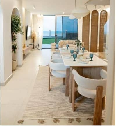 Direct Sea View Fully Furnished Three Bedrooms Chalet with Private Garden with installments in Dayz North Coast