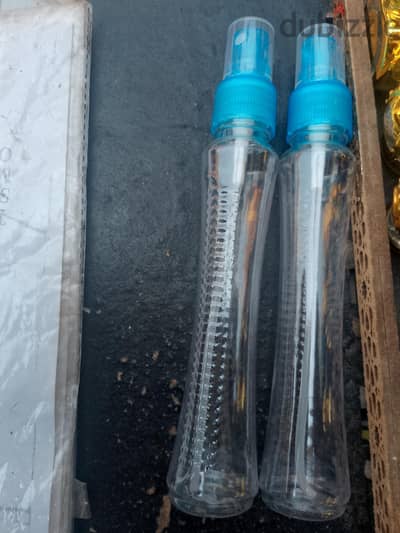 زجاج بخاخ خمسون جرام بلاستيك