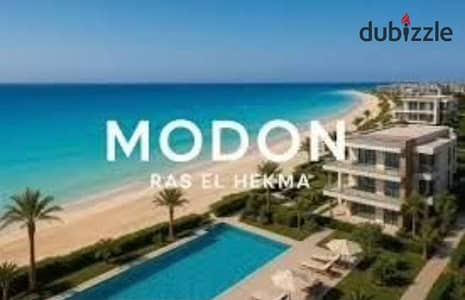 Chalet at half price in front of the first international airport in Ras Al-Hikma with hotel finishing and a direct sea view