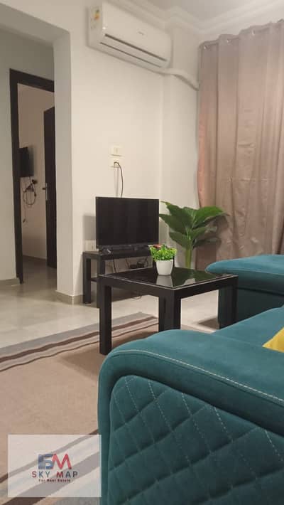 Fully furnished apartment for rent in Madinaty (B7)—an exceptional deal. It features 2 bedrooms and a bathroom, is fully air-conditioned, and boasts c