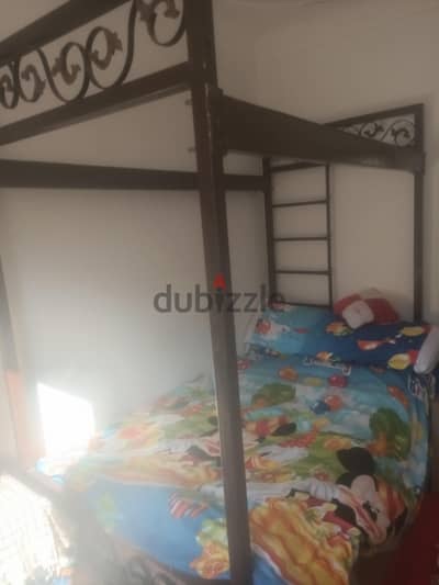 سرير حديد بدورين