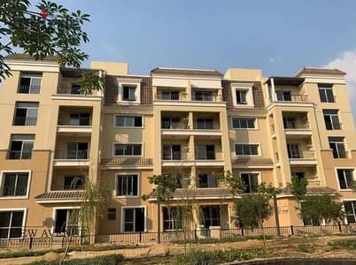 An unbeatable price! An apartment in Sarai Compound, directly on the Suez Road, walled with Madinaty, half price, ready for viewing, with a low down p