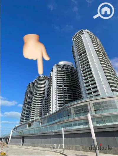 For a quick sale at the old price, a fully finished, ready-to-move-in apartment with air conditioning in Alamein Towers, 156 sq m, double sea and lago