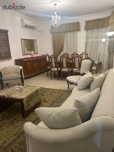 Furnished and air-conditioned apartment for rent on the ground floor next to the American University in the Fifth Settlement