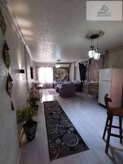 Fully furnished apartment for rent, fully air-conditioned, Arab Al-Maadī, new Awqāf Buildings