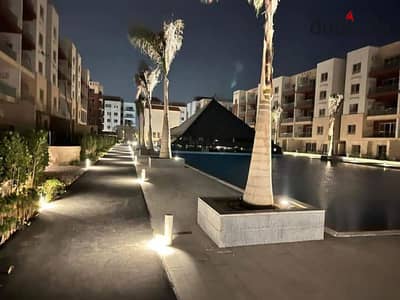 apartment with garden on landscape and pool view in promenade new cairo