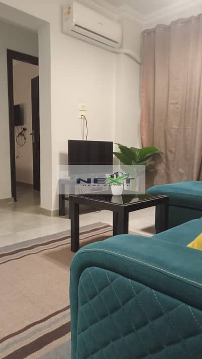 Furnished apartment for rent in Madinaty, 70 sq m in B7, high-end finishing, modern furnishings, clear sea view of the street and garden, very close t