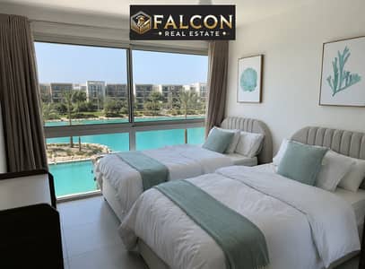 Near Alamein Towers _1st Row Lagoon _USD Rental ROI | Chalet for Sale in Marina 8 | Minutes from Marassi & Latin District