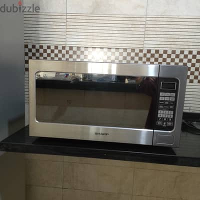 ميكروويف شارب سولو 62 لتر 1200 وات 12 قائمة سيلفر كسر زيرو R-562CR(ST)