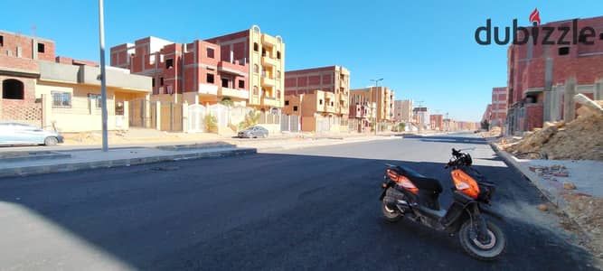 209 SQM Land for Sale in Badr City – 6th District, Zone 5 – North-Facing – Near Services & Main Road – Ready Building Permit & Excavation Permit