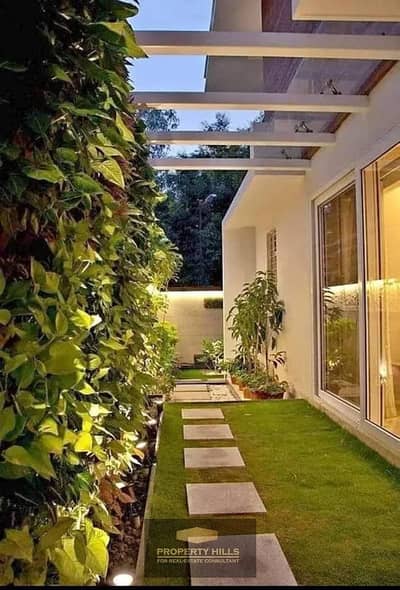 Receive a villa in the heart of Sheikh Zayed next to Cairo Gate in Village West by Dorra behind Royal City