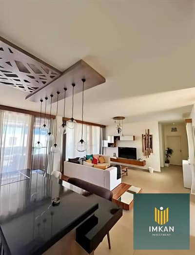 Townhouse for sale in Telal Ain Sokhna, featuring ultra-super-lux finishing and a location facing the sea and the Crystal Lagoon; available with a 12-