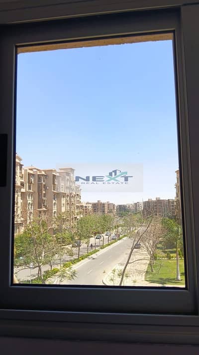 For sale in Madinaty, cash at a bargain price: a 107 sq m apartment in B2, second floor, double frontage, overlooking a garden and a clear sea-facing