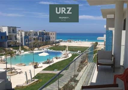 تقدر تعاين الان شالية3 غرف double view تشطيب كامل بالتكيفات واميز لوكيشين وبالتقسيط 8 سنين للبيع في الساحل الشمالي بالقرب من ازها و ذا مد ومانتن فيو