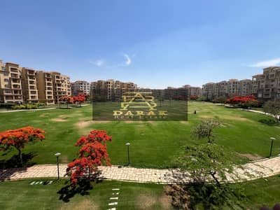 Own the best apartment 250m on a wide garden in Madinaty in front of services B1