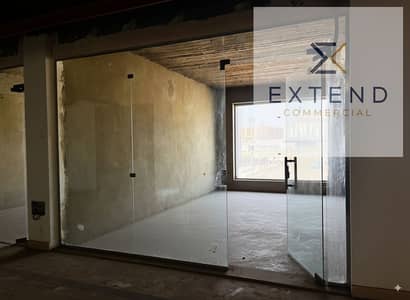 At a special price per meter in the most important locations of October 6 on the central axis, a cafe for rent with interior and outdoor spaces within a commercial mall with high vitality