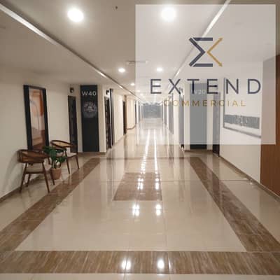 Large administrative unit for rent with an area of 280 sqm inside a commercial mall in the heart of 6 October on the central axis in front of the University of Culture and Sciences