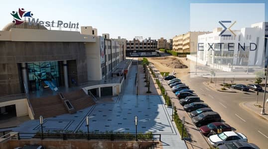 Office for rent inside a commercial mall in front of the University of Culture and Science and on the central axis in 6th of October City at a prime location