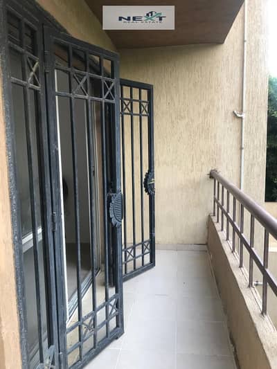 For sale in Madinaty, a bargain price for ground floor garden lovers: a 106 sq m apartment + 40 sq m garden in B6 with a clear sea view and garden, ve