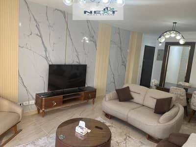 Furnished apartment for rent in Madinaty, 116 sq m in B12, ultra-super deluxe finishing, garden view, and direct sea access. Very close to amenities,