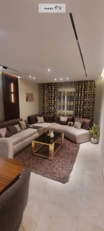 **Furnished Apartment for Rent – ​​Madinaty | B12** * **Area:** 103 sq m * **Layout:** 3 Bedrooms + 2 Bathrooms * **Floor:** 4th * **Finishing and Fur