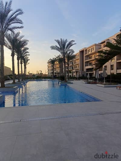 شقة بجاردن متشطبة بالمطبخ والتكييفات ودريسينج روم للبيع في أب تاون كايرو إعمار Uptown Cairo Emaar