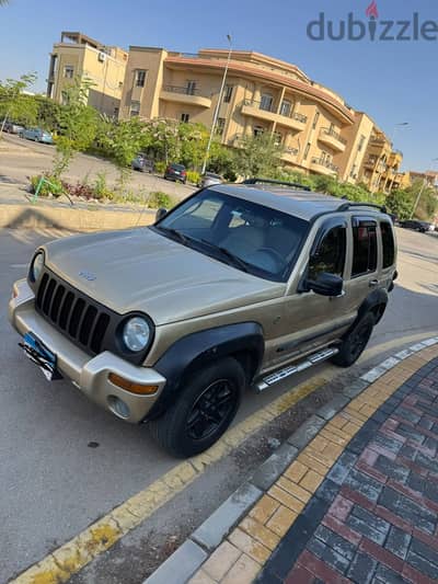 Jeep Liberty 2003 جيب ليبرتي لون ذهبي مميز